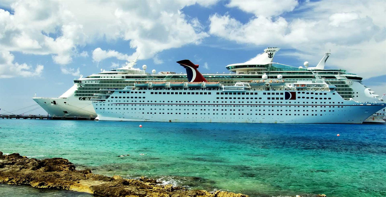 Carnival cruise ship in turquoise Caribbean water